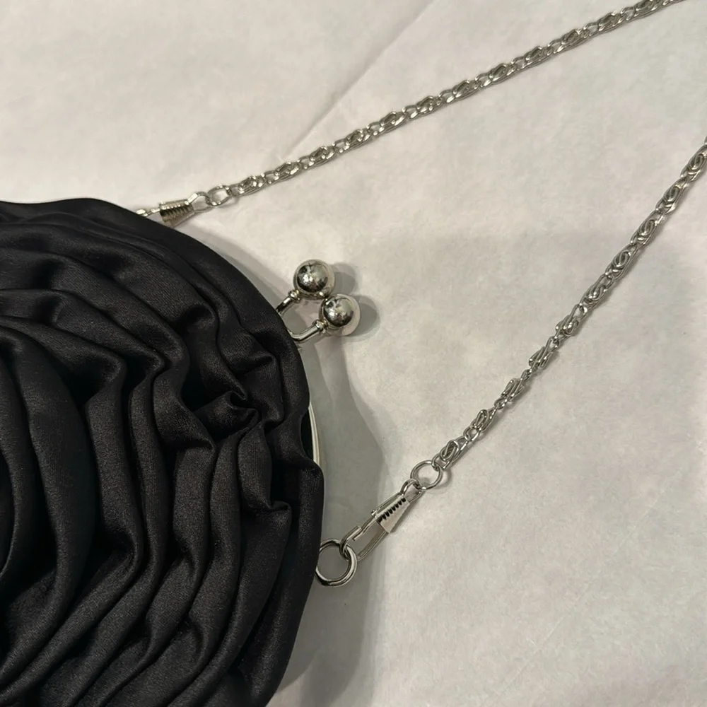 Black satin rosette purse with removable silver chain